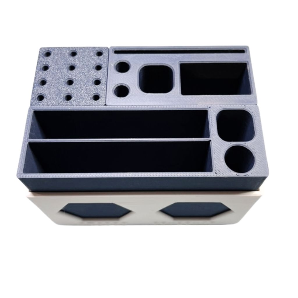 AJ Newell Essential Tray Kit with three blue modular inserts in a white hex-pattern tray